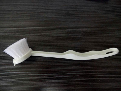 A cleaning brush.